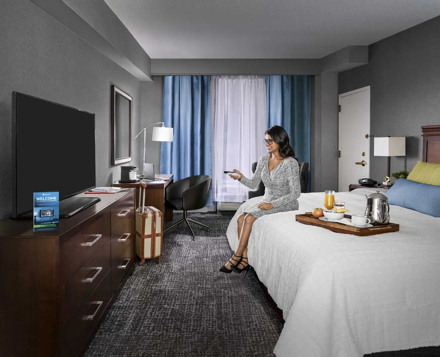 Hotel room with a wall-mounted TV